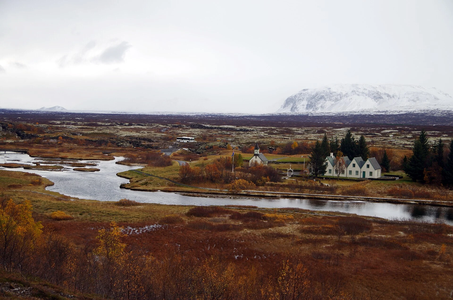 Þingvellir church and river with snow on the distant hills